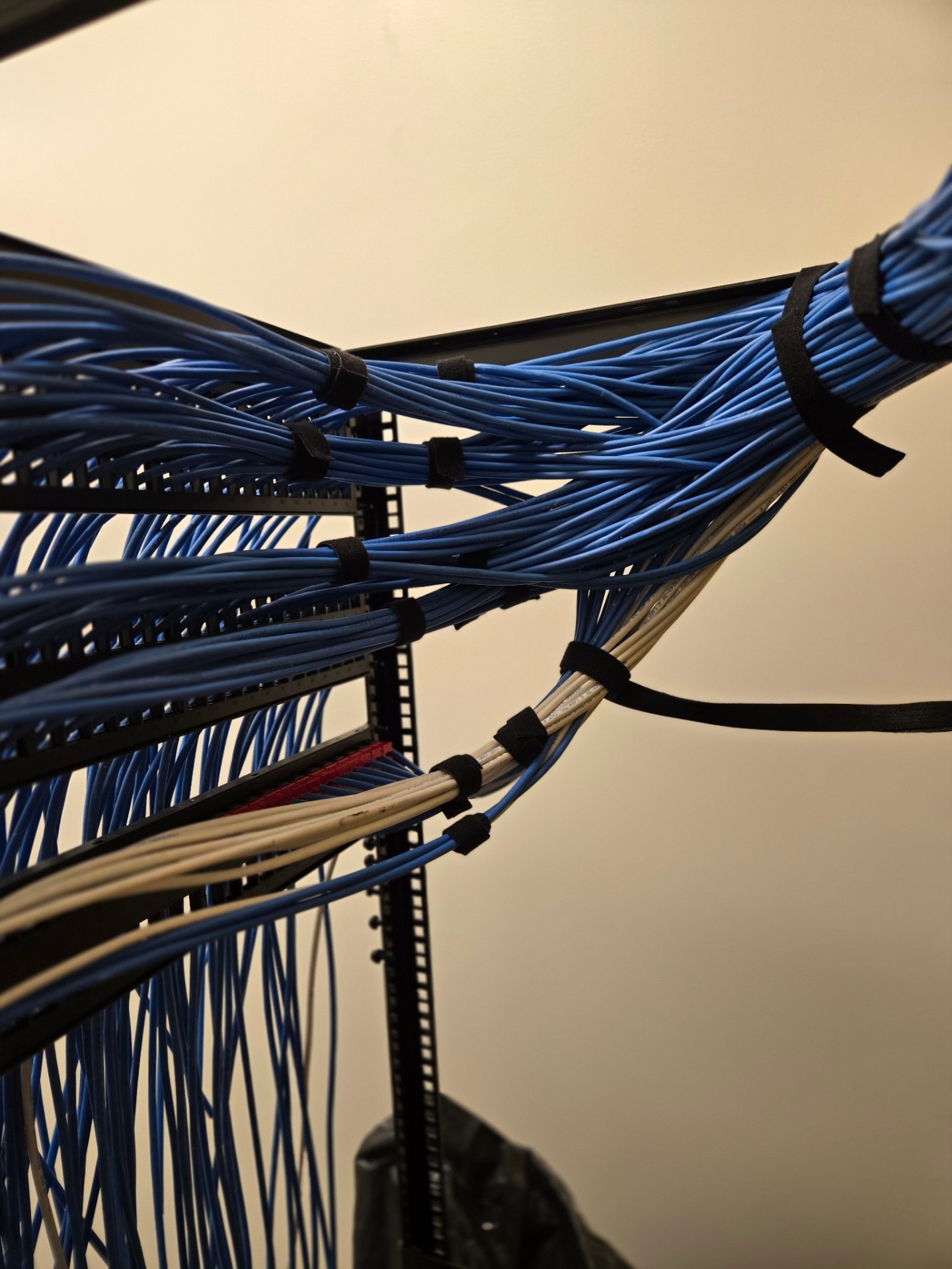 Structured cabling bundle entering vertical managers – Boston area business network wiring